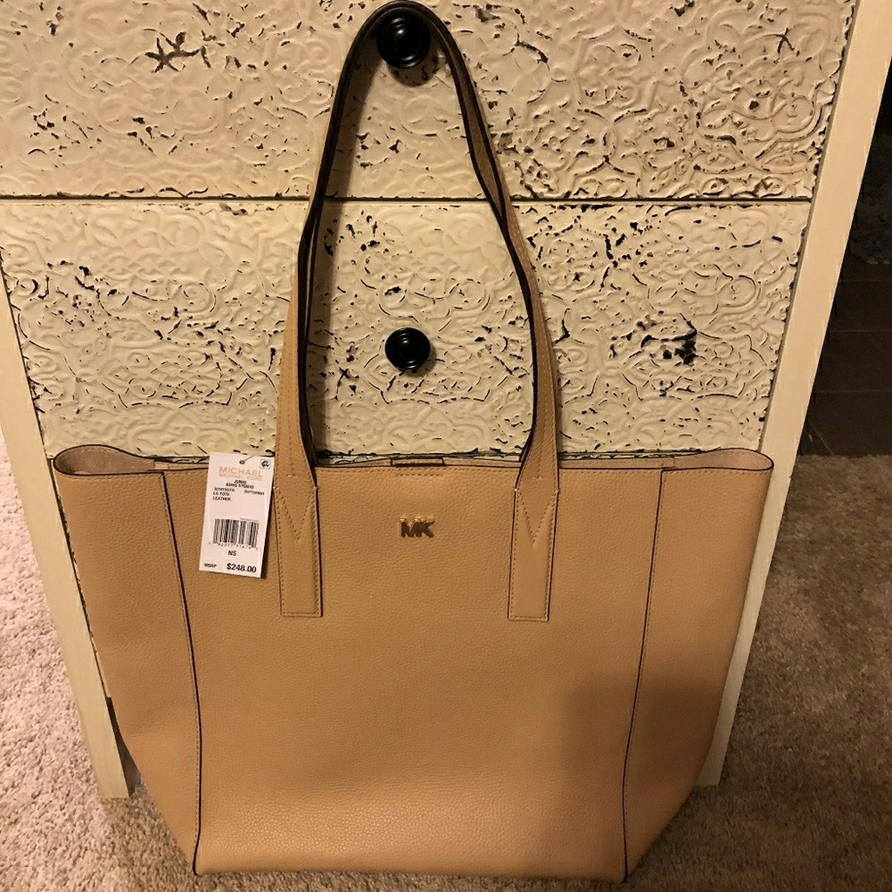 2 Mk New purses $100 each